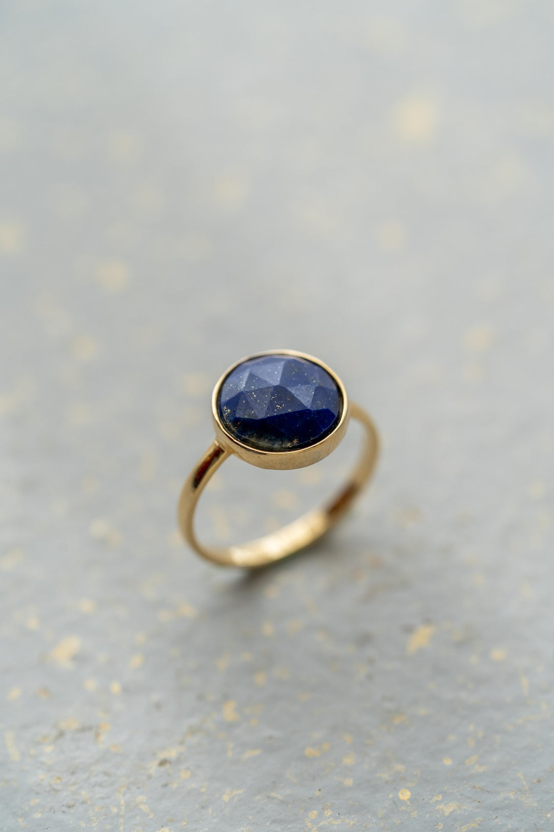Multi-faceted lapis ring